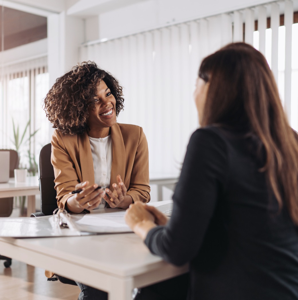 A one-to-one conversation across a desk